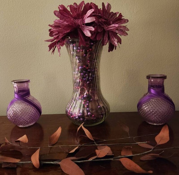 Raspberry vase and two matching vases or candle holders
