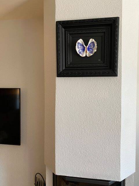 "Blue Emperor' (2022). Negar Rashidi. Glass Paint on Oyster shells. 25cm x 30cm (with frame 45cm x 50cm)