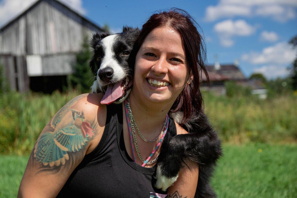 Dresseuse avec son chien border collie qui font un selfie a saint-come liniere