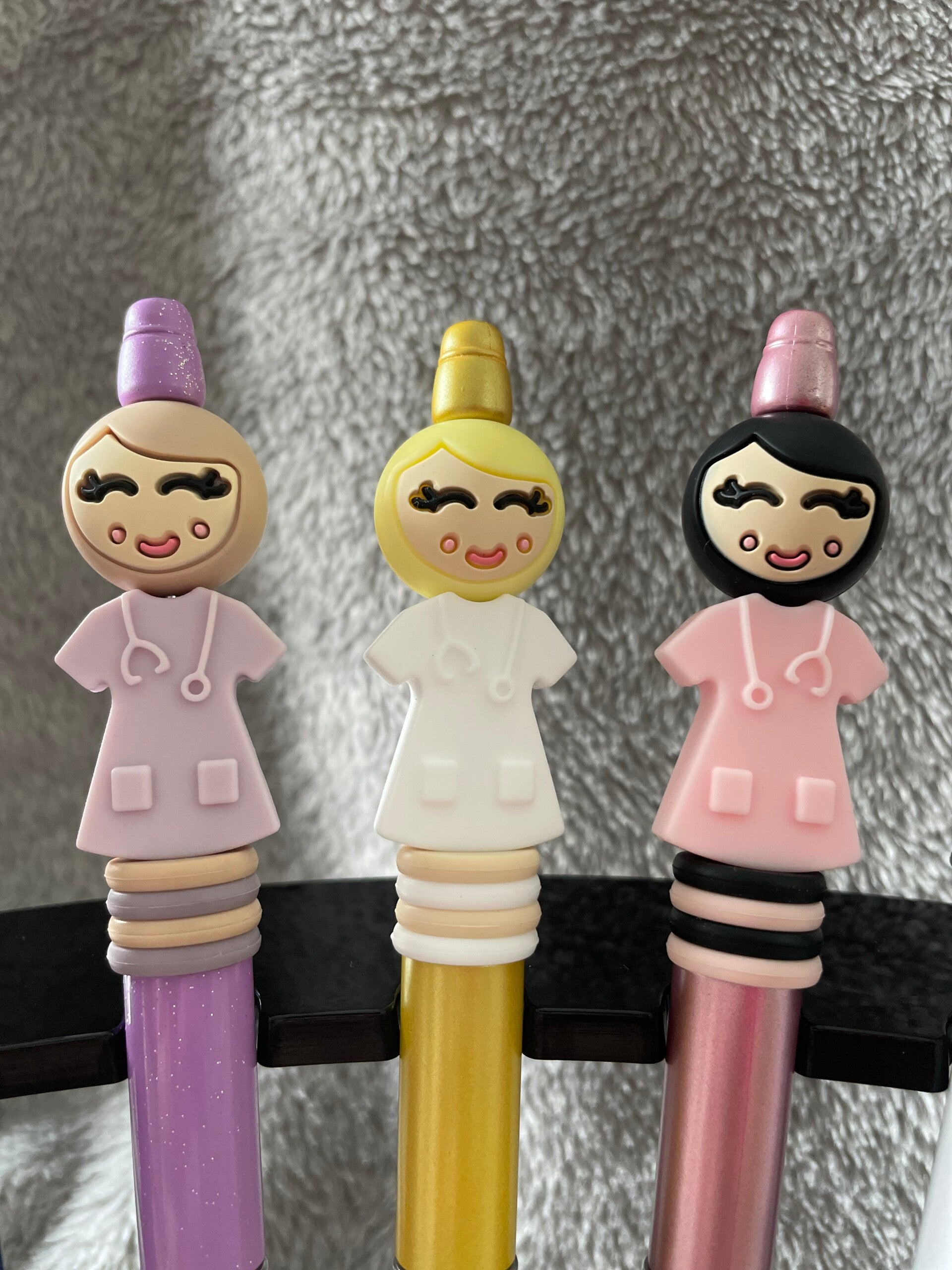Popje van geluk zorgpen