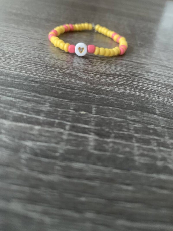 Armband geel met roze