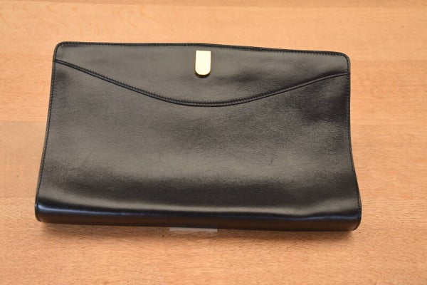 Delvaux vintage clutch in zwart leer