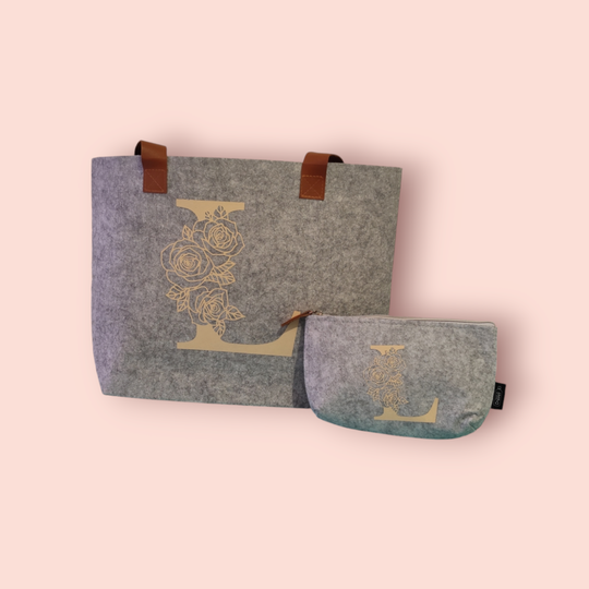 Bolso fieltro con asas de cuero y neceser
