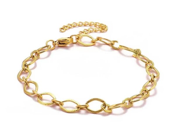 armband ribbel schakel grof goud