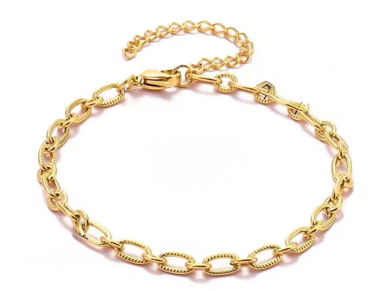 armband ribbel schakel medium goud