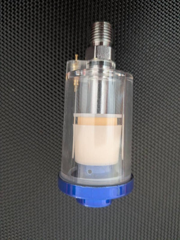 Spray gun oil and water filter. Attaches to the spray gun