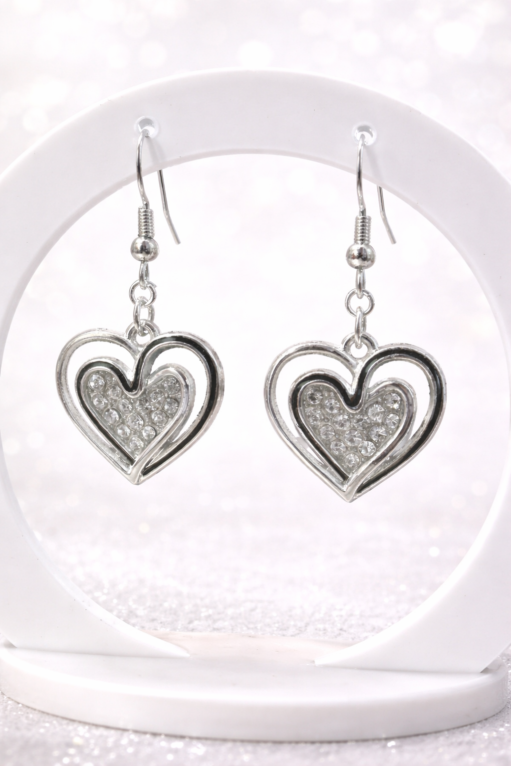 Boucles d’oreilles cœur argenté et strass