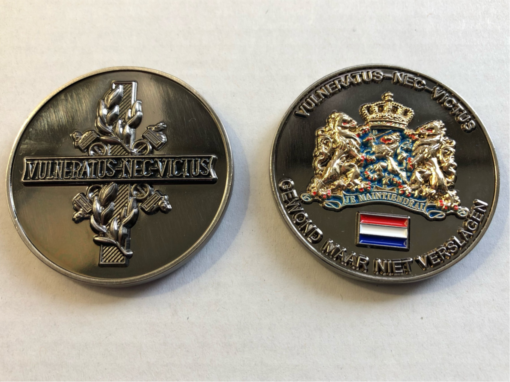 Draaginsinge gewonden coin