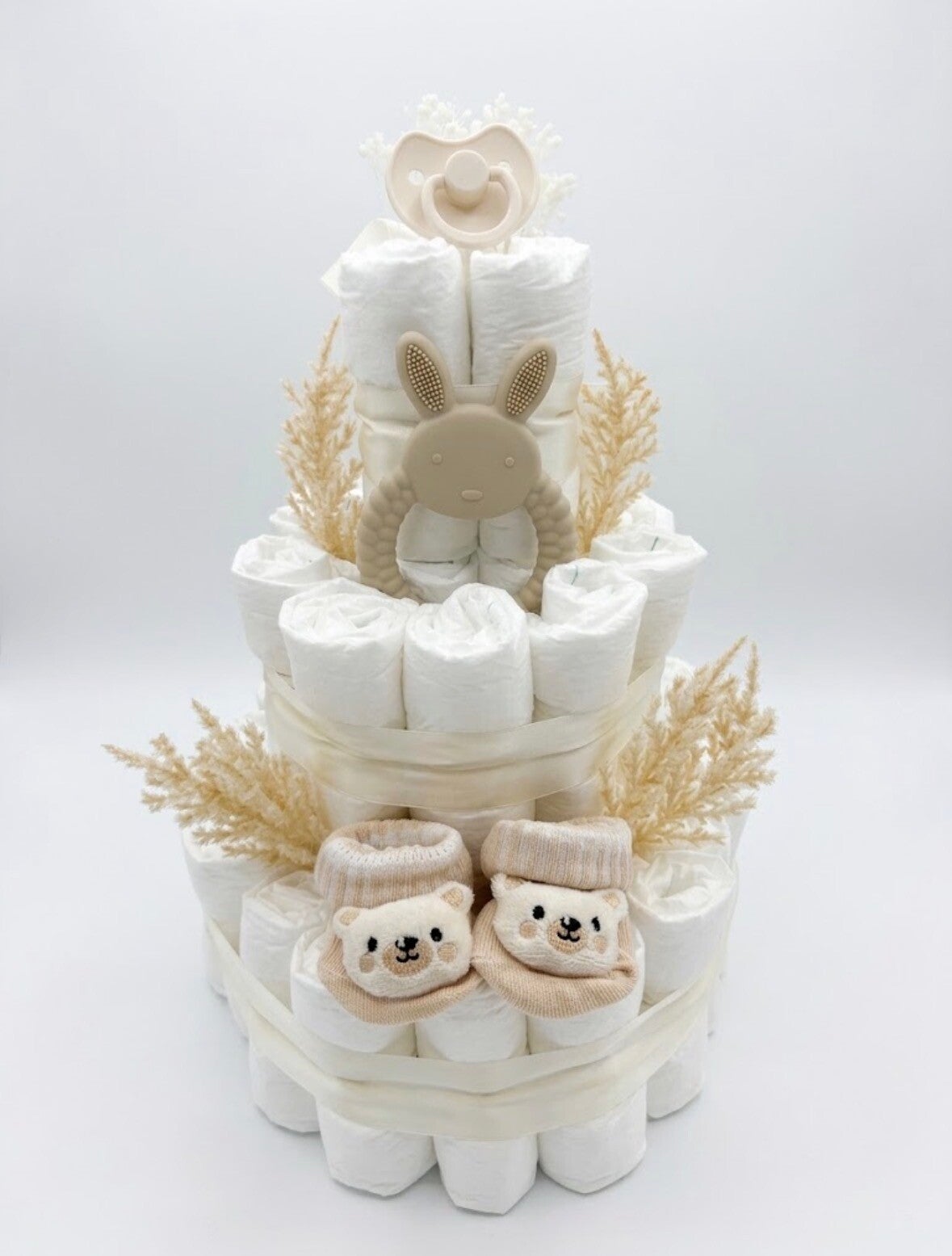 Baby luiertaart met droogbloemen