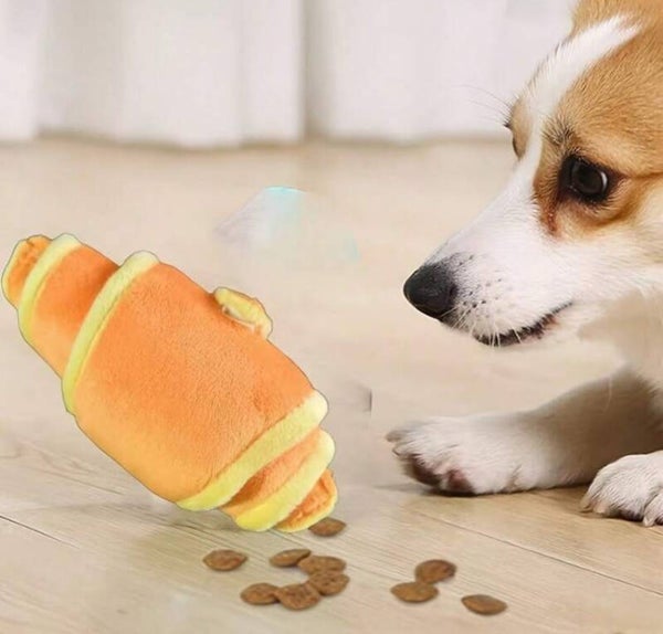 Honden snuffel croissant