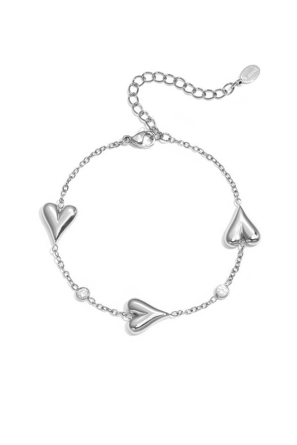 Drie massieve harten en steentjes armband Zilver