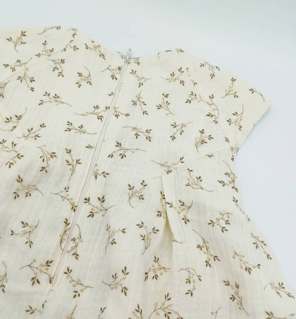 Kleedje mousseline takjes