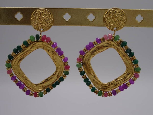 Boucle d'oreilles losange cernée de pierre