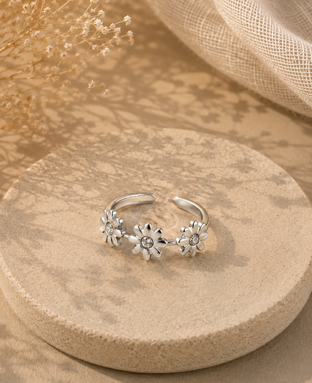 Bague argentée trois fleurs