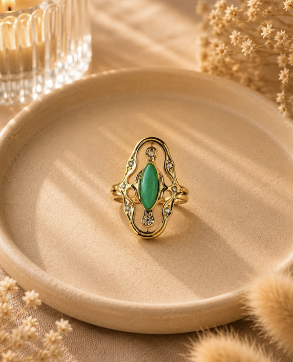 Bague dorée pierre verte