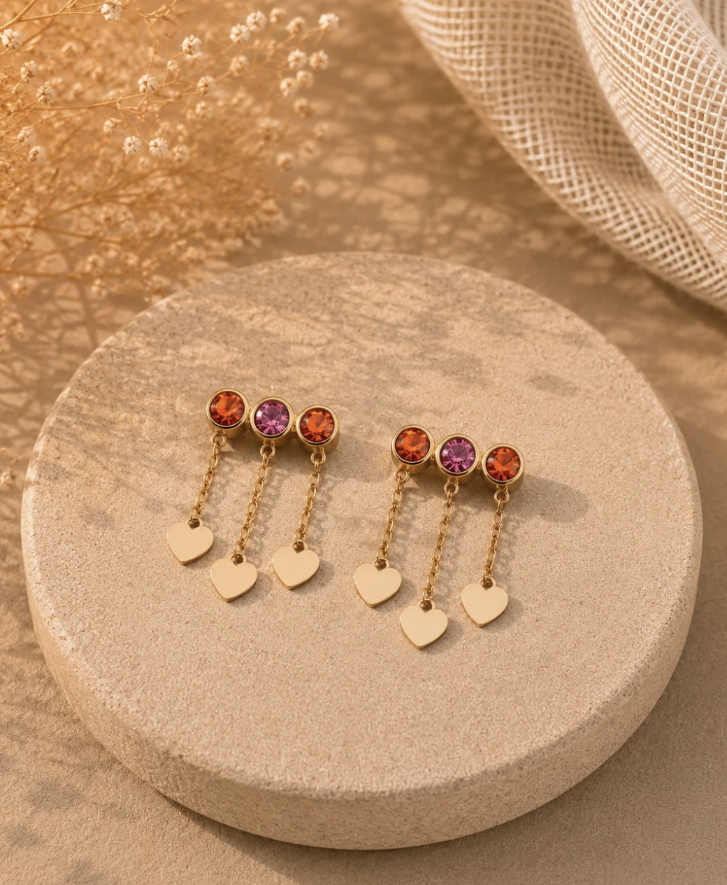 Boucles d’oreilles dorées cœurs colorés