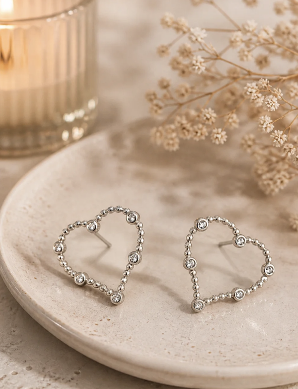 Boucles d’oreilles cœur argenté à strass