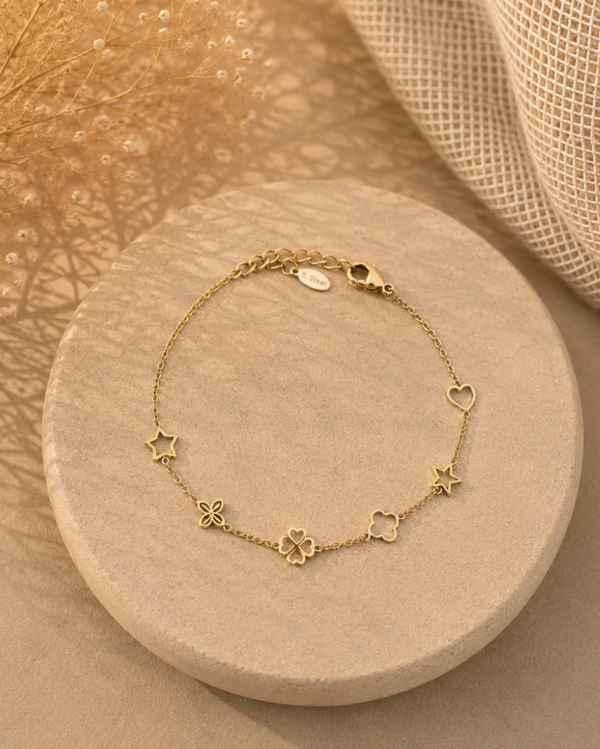 Bracelet doré multicharmes