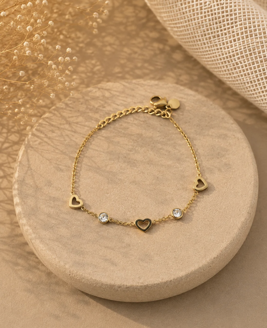 Bracelet doré cœurs et strass
