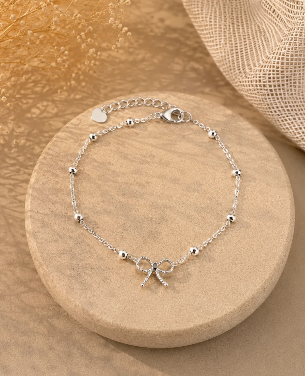 Bracelet argenté petit nœud