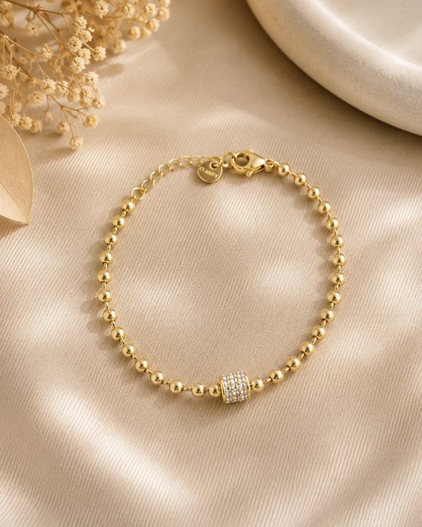 Bracelet doré perles et strass