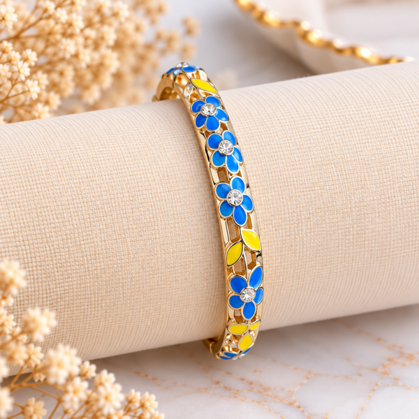 Bracelet jonc doré fleurs bleues & jaunes – Éclat floral