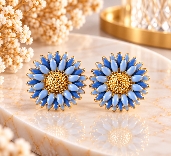 Boucles d’oreilles fleurs bleues et dorées