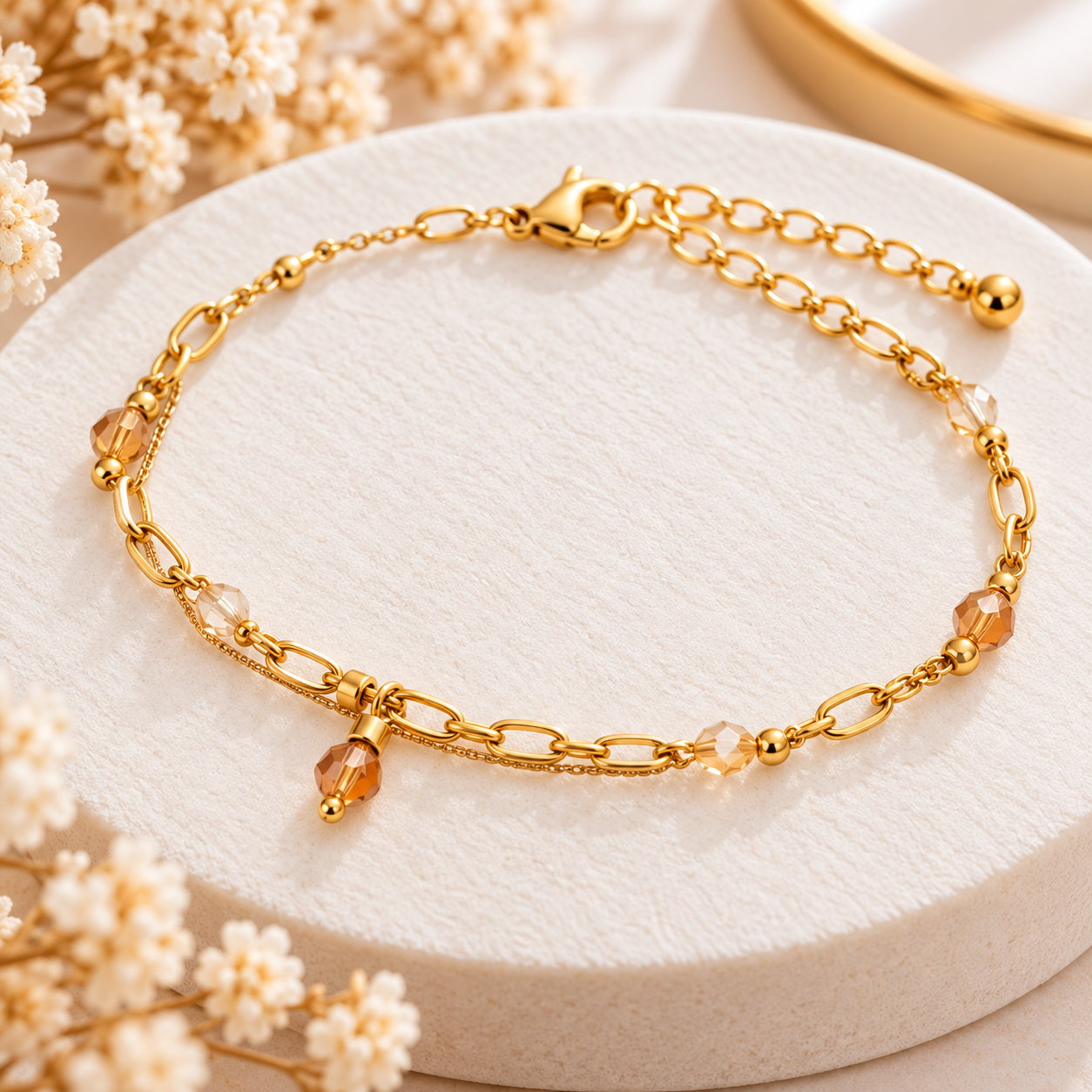 Bracelet doré double chaîne et perles champagne