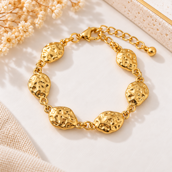 Bracelet doré à médaillons martelés