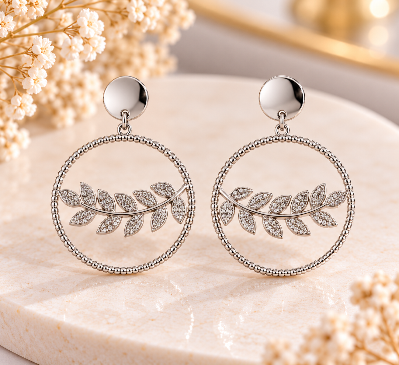 Boucles d’oreilles créoles feuillage argentées – Acier inoxydable