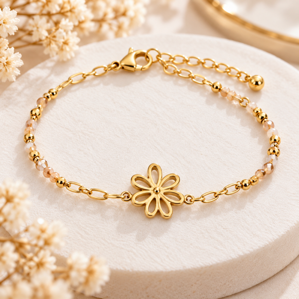 Bracelet doré fleur ajourée et perles délicates
