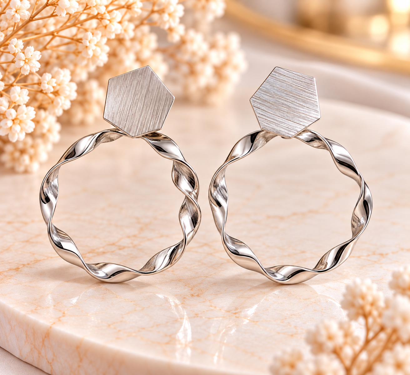 Boucles d’oreilles créoles torsadées argentées – Acier inoxydable