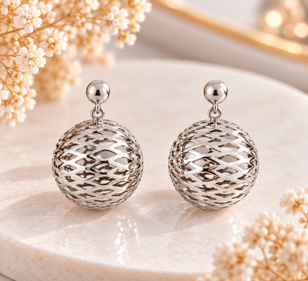 Boucles d’oreilles boules ajourées argentées – Acier inoxydable