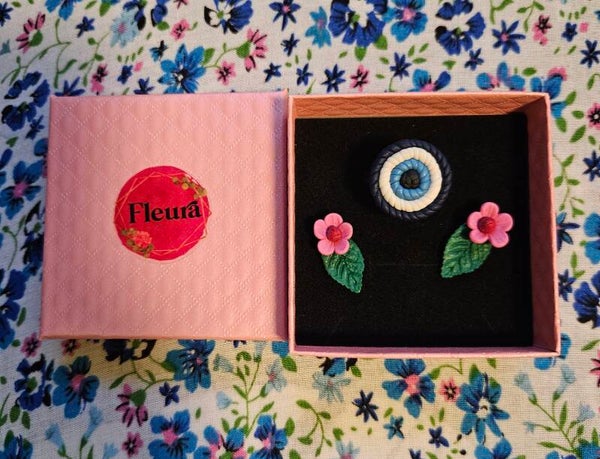 Evil eye ring with floral stud earrings