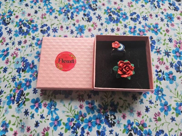 Floral ring and evil eye ring