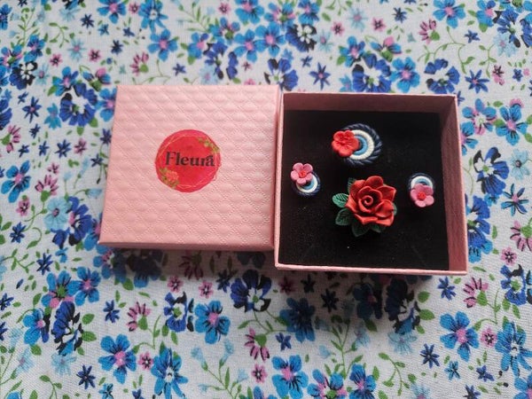 Floral ring and evil eye ring and earrings