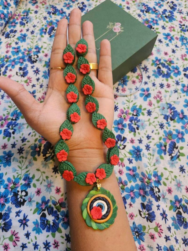 Floral evil eye pendant necklace