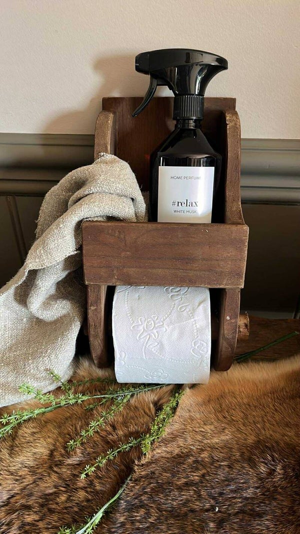 Toiletpapierhouder met extra bakje