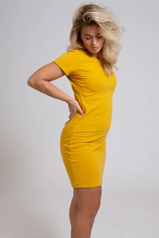 new Angels jurkje Annabelle, gemaakt van biologisch katoen. Sweaterjurkje van biokatoen. Mooi duurzaam  jurkje in oker geel. yellow dress made of organic cotton. Fashionlabel New Angels is a Dutch fashionbrand by Ingrid de haan