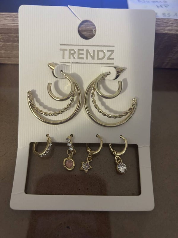 boucle d'oreille dorée etoile