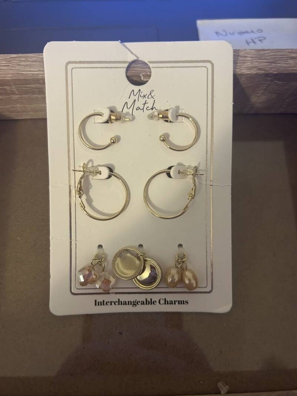 boucle d'oreille dorée rose