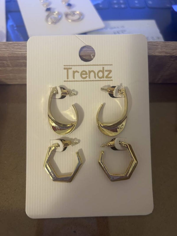 boucle d'oreille dorée hexagone