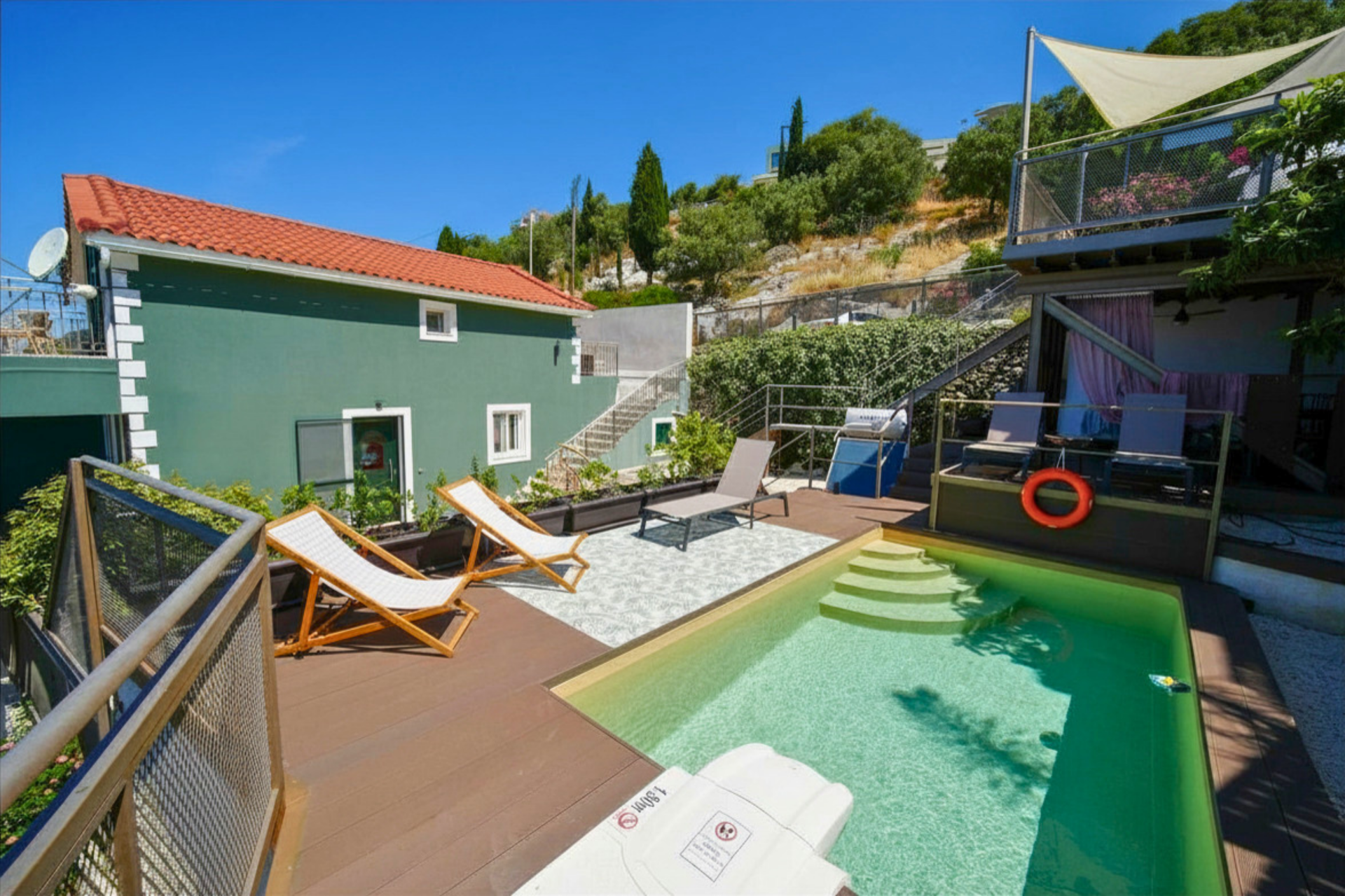 Private swimming pool and outdoor living area at Trithea Villa
