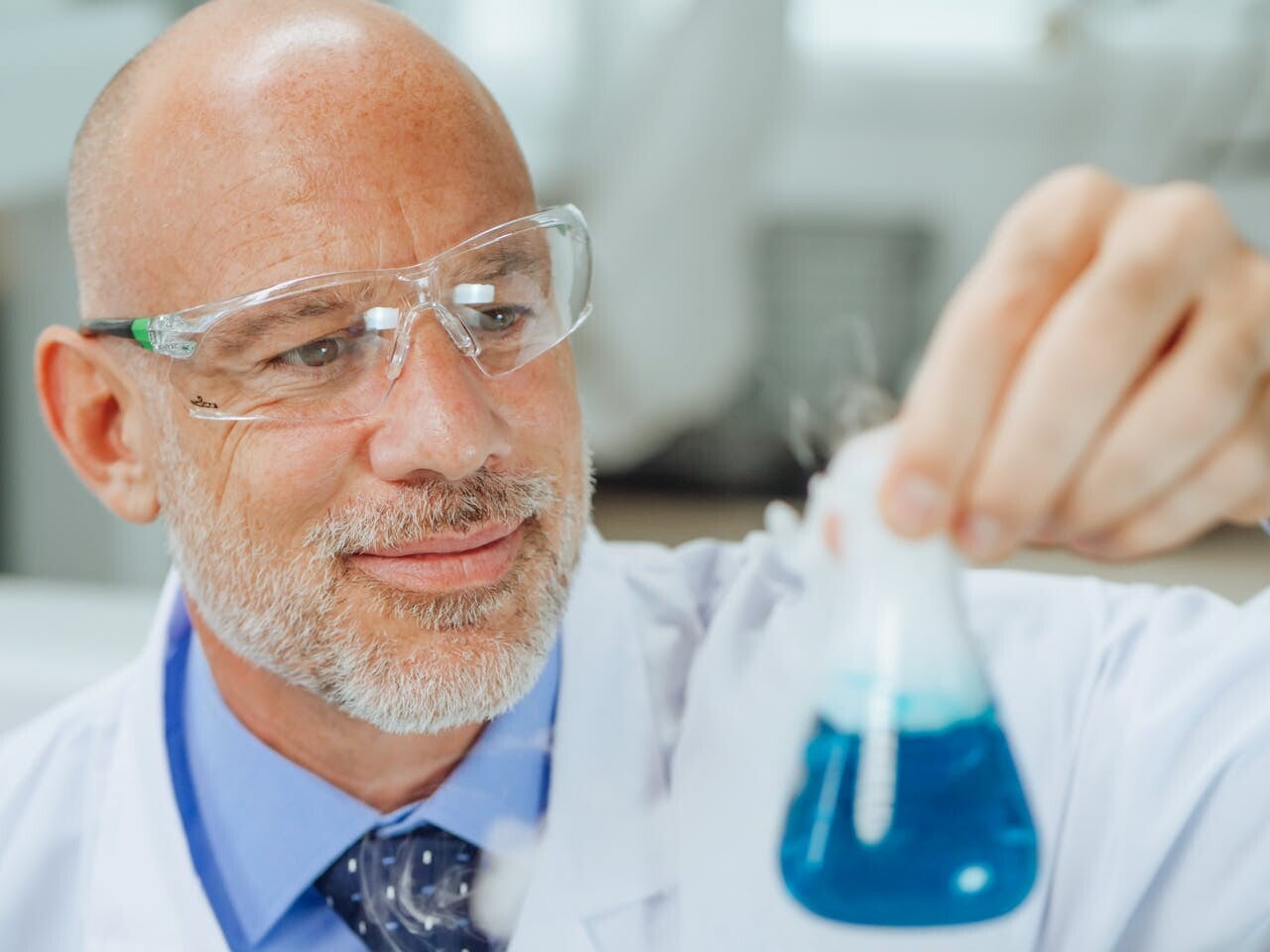 Clinical immunologist examining samples for peptide research