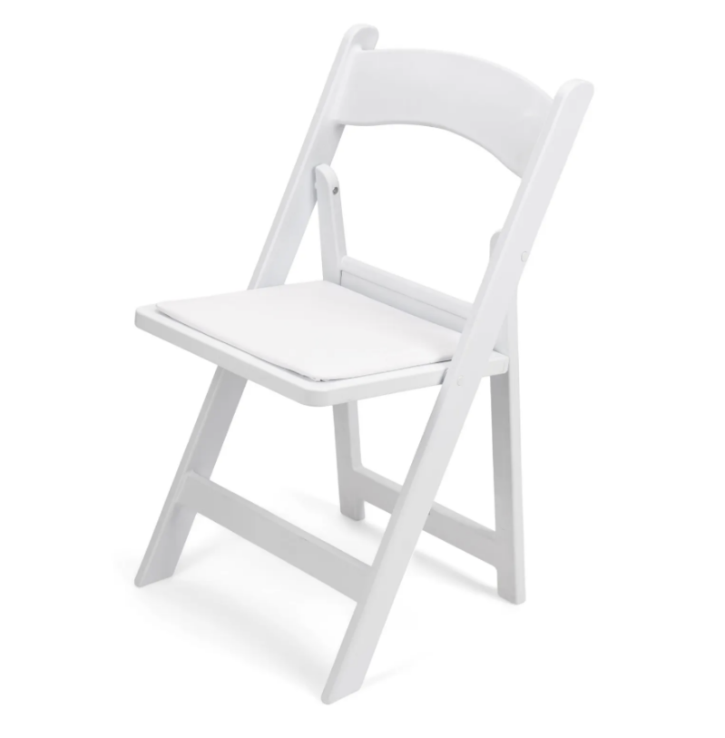 White resin folding chairs set up for a wedding ceremony in Fox Valley, WI