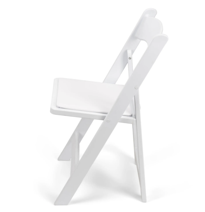 White resin folding chairs set up for a wedding ceremony in Fox Valley, WI