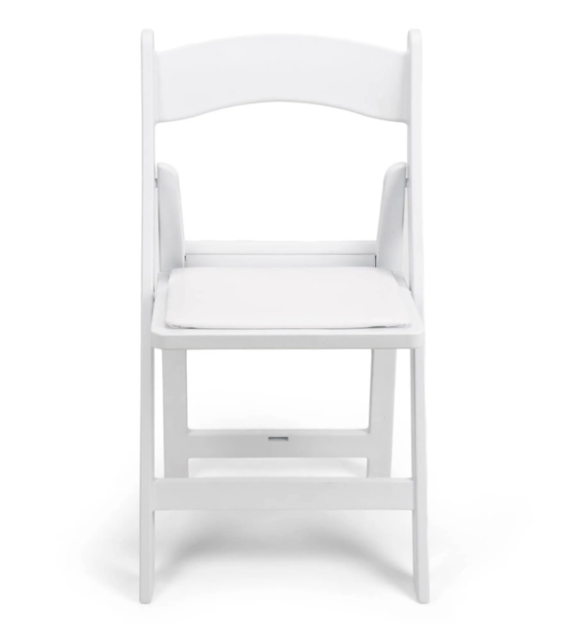 White resin folding chairs set up for a wedding ceremony in Fox Valley, WI