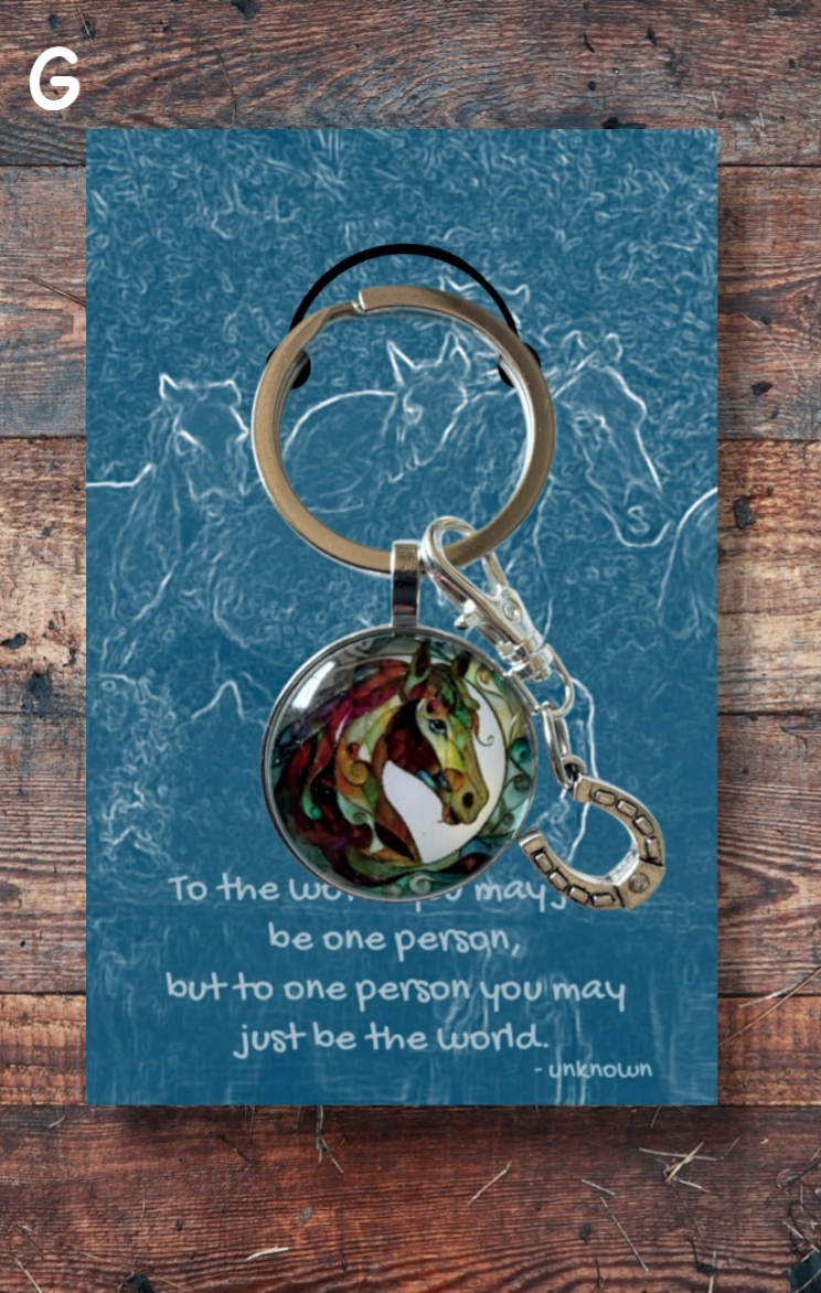 Stained glass effect horse head with silver horseshoe charm on blue card