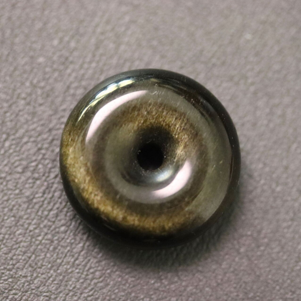 Obsidiaan goud donut 2.4 cm