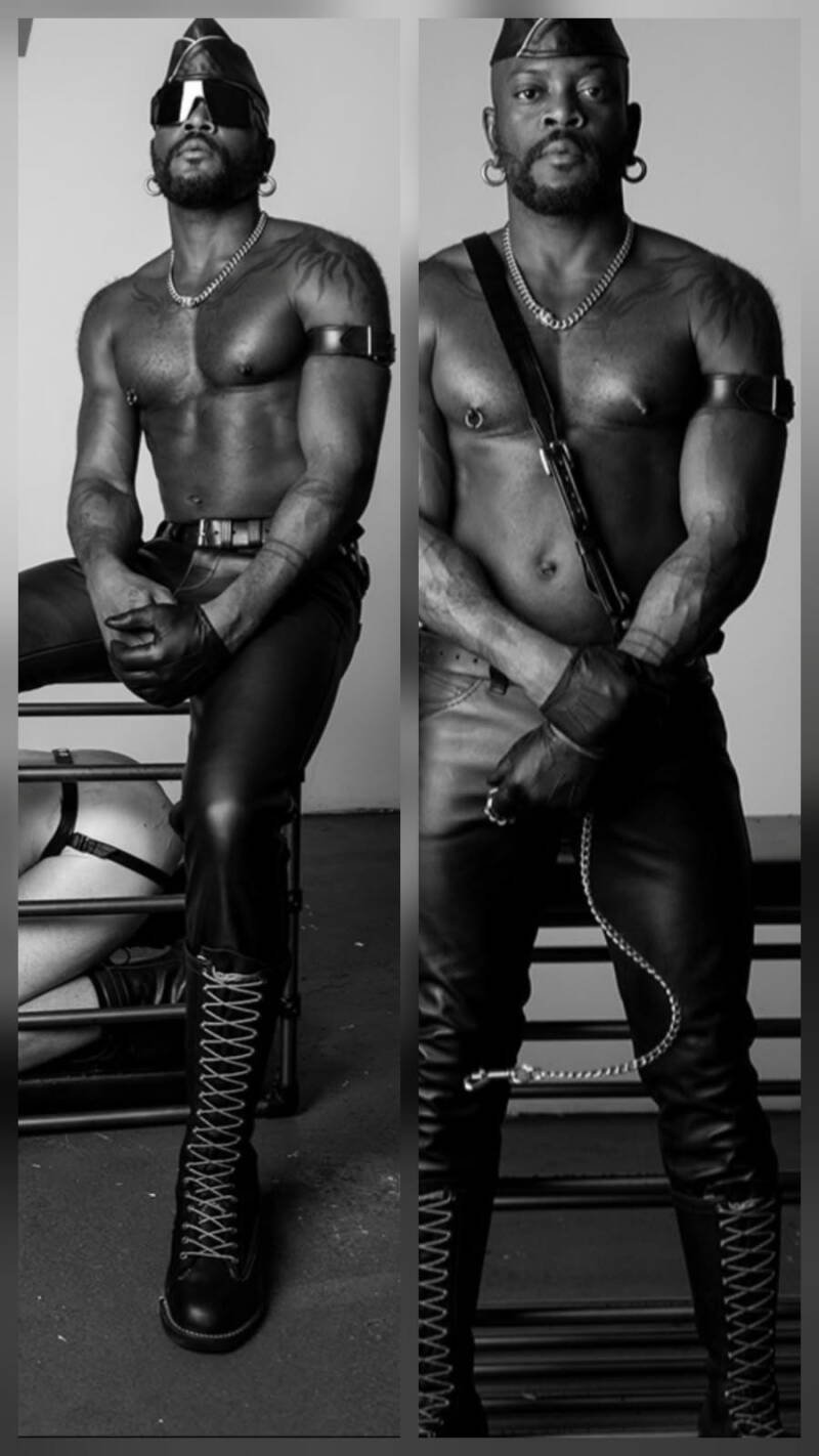 "Black  Dom with his chest exposed in a leather harness and leather pants, confidently posing in a cocky, powerful stance, illustrating leadership, dominance, and authority."